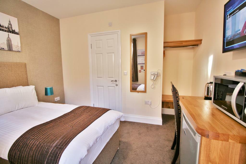 New County Hotel & Serviced Apartments By Roomsbooked Gloucester Rom bilde